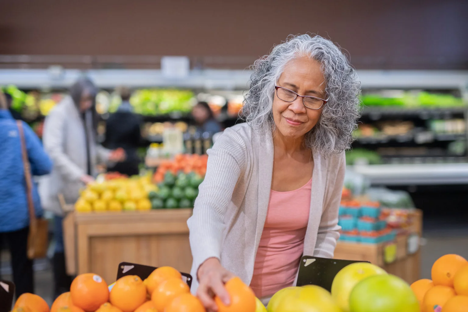 Senior woman grocery shopping
